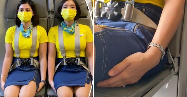 Why Do Flight Attendants Sit on Their Hands During Takeoff and Landing? The Real Reason Explained